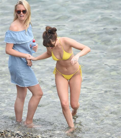 Dakota Johnson In A Yellow Bikini On The Set Of Fifty Shades Darker