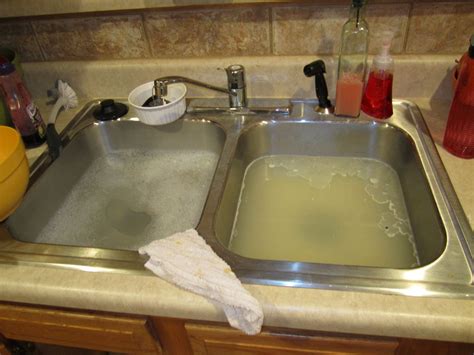 See kitchen sink drain stock images. How to Clean A Clogged Kitchen Sink Drain - Rustic Kitchen ...