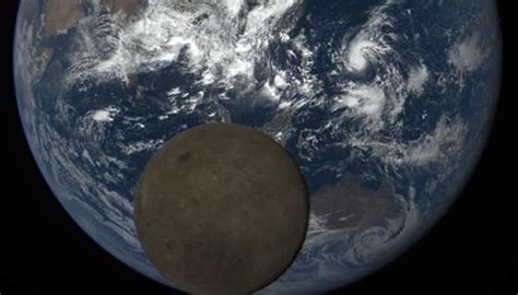 Wow Nasas Epic Camera Catches Moon Photobombing Earth Watch Video