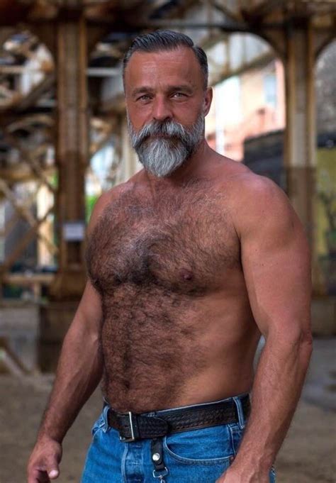 An Older Man With A Beard And No Shirt