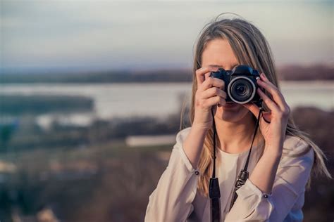 Photographer Woman Girl Is Holding Dslr Camera Taking Photographs