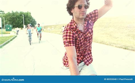Three Young Adults Having Fun Cycling And Taking Selfies Graded Stock Footage Video Of Cell