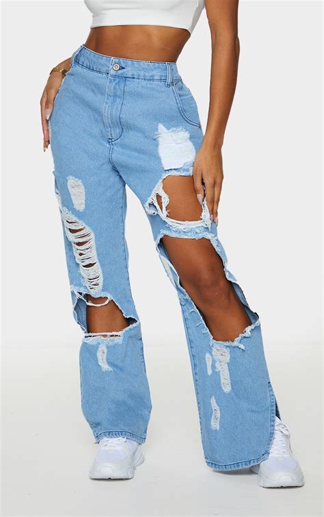 Shape Light Blue Wash Ripped Split Hem Jeans Prettylittlething