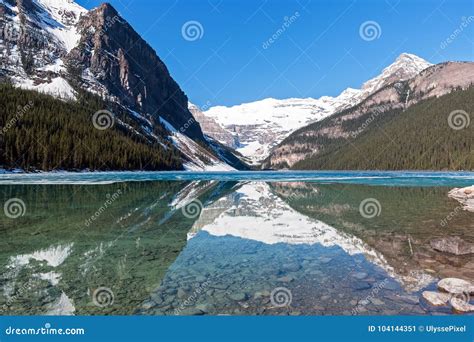 Snowy Mountain Reflection On Lake Louise Banff Alberta Canada