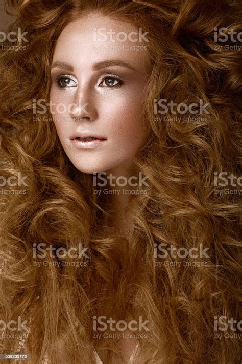 Beautiful Redhead Girl With A Perfectly Creative Curls Hair And Stock
