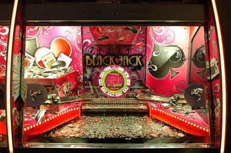 There's all these prizes of money, chips, even gold coins and a lot of $100 how does that machine make that money back that it's giving away? Black Jack 2 player - Coin Pusher | VDW International