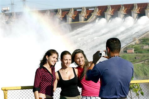 roundtrip transfers with brazilian and argentine waterfalls sides itaipu dam and city tour