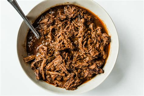 Slow cooking at low heat is what melts the tough connective tissue between the muscle fibers, leaving you with tender meat that pulls apart with your fork. 4 Ingredient Instant Pot Chuck Roast - Reluctant Entertainer