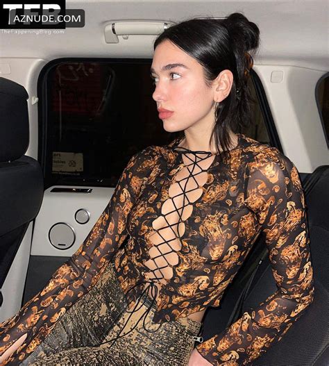 Dua Lipa Sexy Poses Showing Off Her Nude Tits In A See Through Top On