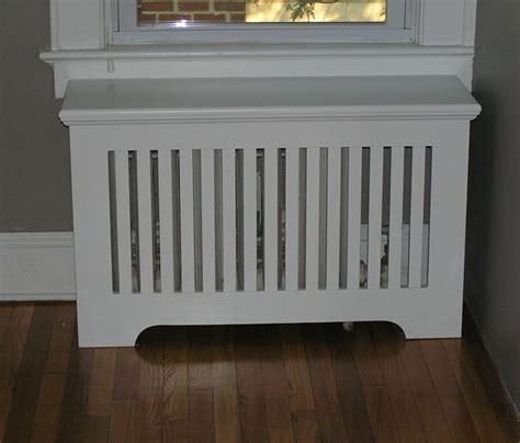 A decorative radiator used to be considered a luxury purchase however they are now a common item in homes. Custom Mission Radiator Cover by Cabinetmaker Cabinets By ...