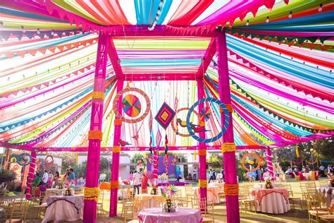 Mela Themed Colorful Mehndi Sangeet Wedding Photography Ahmedabad