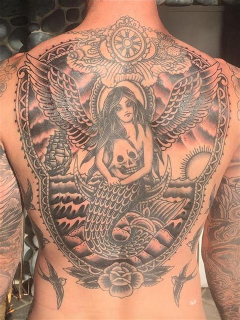 6 MONTHS?! Adam Levine reveals new back tattoo which is HUGE... but