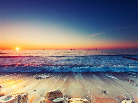 Sunrise Over The Horizon Sea Ships Sandy Beach Waves Beautiful