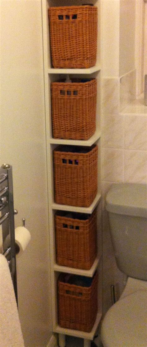 You'll be able to increase storage space no matter how small your. close up of the bathroom shelves with baskets | Small ...