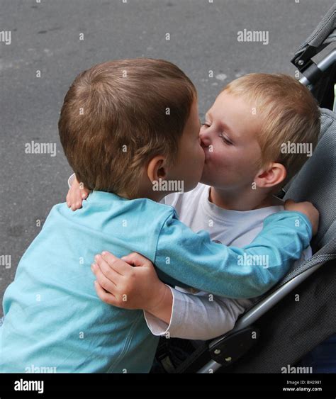 Brotherly Love 2 Brothers Sharing A Kiss Stock Photo Alamy
