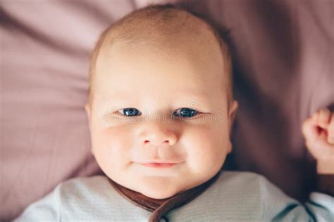 Closeup Portrait Of Cute Adorable Funny White Caucasian Blond Little