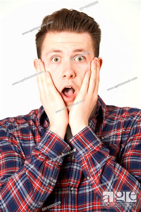 Studio Portrait Of Man With Shocked Expression Stock Photo Picture