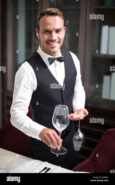 Waiter Setting The Table Stock Photo Alamy