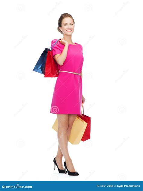 Smiling Woman In Pink Dress With Shopping Bags Stock Photo Image Of