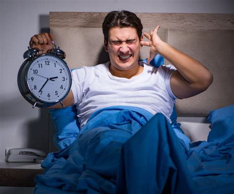 Man Having Trouble Sleeping In Bed Stock Photo Image Of Morning