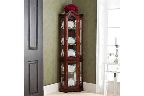 How To Decorate A Corner Curio Cabinet Leadersrooms