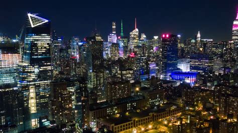 Aerial Night View Of Manhattan New York City Skyscrapers Around