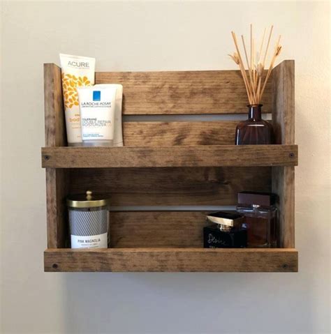 Two sets of thick wooden shelves replace the need for a cabinet in this spa bathroom by veranda interiors. 10 Simple and Cheap DIY Wooden Shelf Design Ideas For Your ...