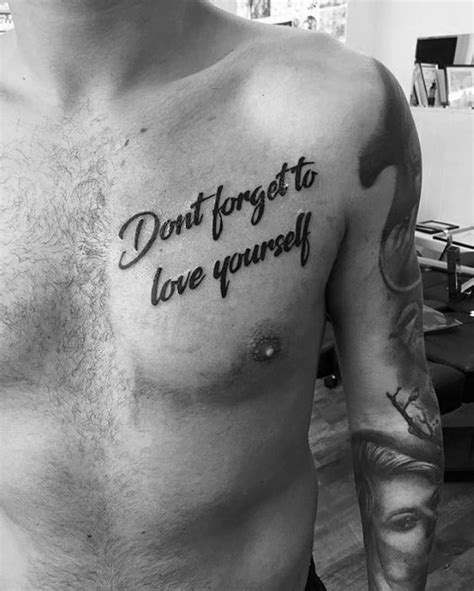 The words, when inked in a bold and edgy style, seem to become even more significant. 50 Chest Quote Tattoo Designs For Men - Phrase Ink Ideas