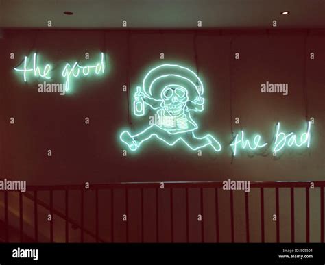 The Good And The Bad Neon Sign At A Mexican Restaurant Stock Photo Alamy