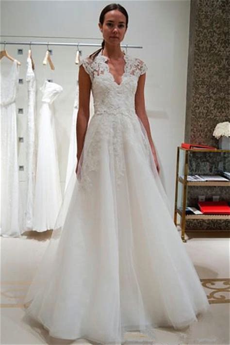 You can still choose from a range of a cap sleeve bridal dress is a great short sleeve choice that will suit most brides. A-line Cap Sleeve Wedding Dress V-neck Lace Appliques ...