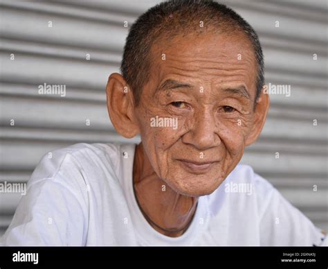 Old Skinny Resourceful Positive Malaysian Chinese Trishaw Rickshaw Driver With Lived In Face And