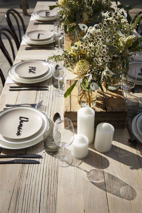 The icon by design flagship store is designed to bring you an exceptional shopping experience. Simple, relaxed table setting with greenery and candles ...