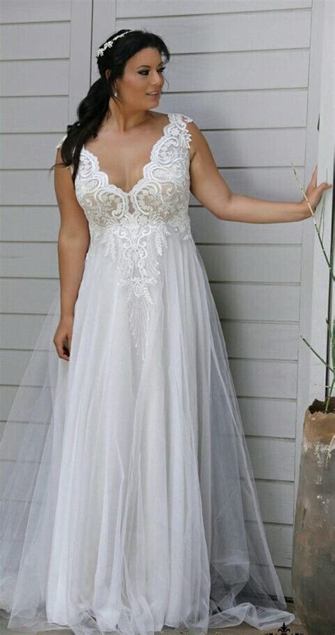 Unique Plus Size Wedding Gown With A Gentle Flowy Skirt