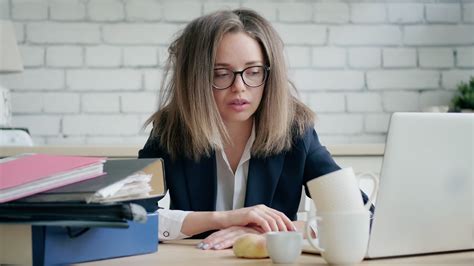 Funny Portrait Of A Disheveled Business Woman Tired From Work Stock