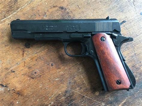 Us Colt 1911 With Plain Wooden Grip Shells Pistol Model