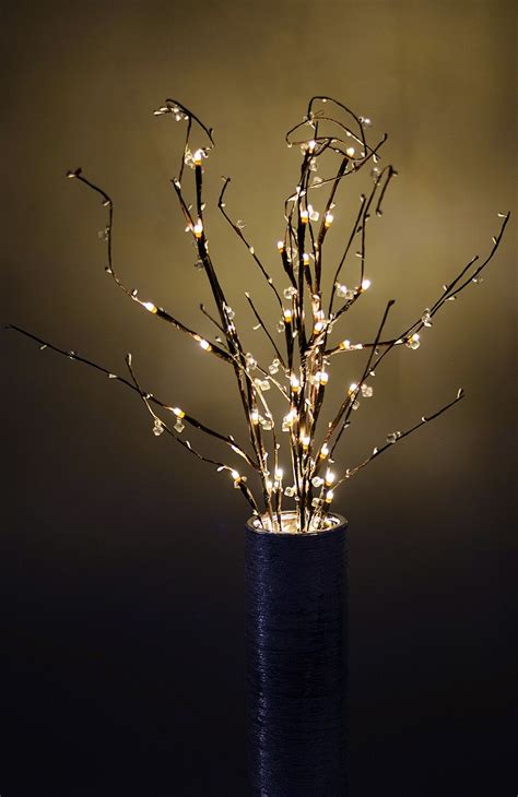 This manzanita tree branch centerpiece was used for a baby shower gift table. LED crystal branches | Wedding centerpieces diy, Lighted branches, Lead crystal