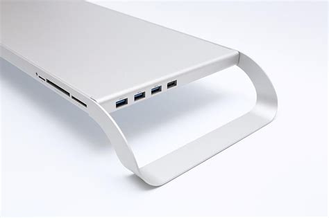 Die monitorerhöher werden auf dem schreibtisch beliebig und flexibel platziert, der bildschirm auf der erhöhung positioniert und fertig. Monitormate: Stand mit integriertem Hub und Kartenleser ...
