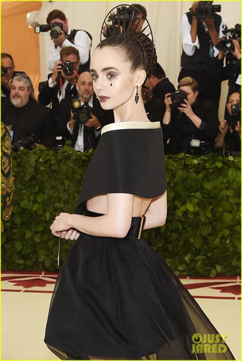 Lily Collins Carries Rosary Beads on Met Gala 2018 Red Carpet: Photo