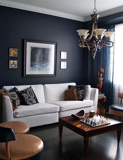 This room sure is bright with the space being mostly white. Image result for black and blue urban loft | Blue living room decor, Brown and blue living room ...