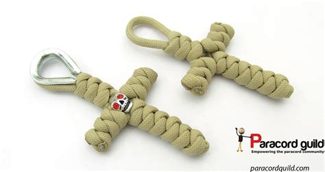 The snake knot is a really easy knot to learn to tie. Snake knot paracord cross - Paracord guild