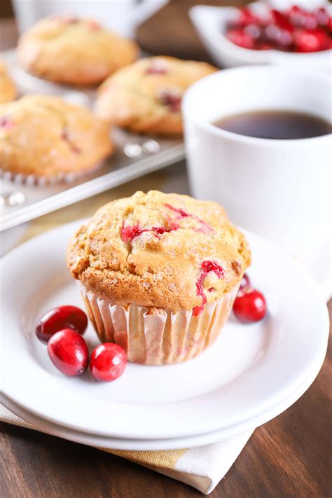 These sourdough cranberry muffins are both sweet and tart, and are topped with a tasty cinnamon topping. Bakery Style Cranberry Orange Muffins - A Kitchen Addiction