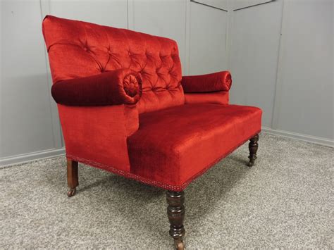 An antique victorian sofa circa 1890, reupholstered in a dark navy velvet from herman miller. Very Cute Small Velvet Victorian Window Or Bedroom Sofa | 627008 | Sellingantiques.co.uk