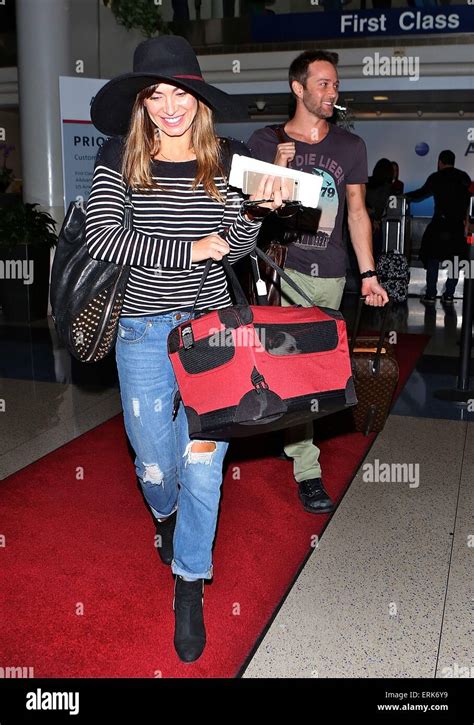 Karina Smirnoff Arrives At Los Angeles International Lax Airport With