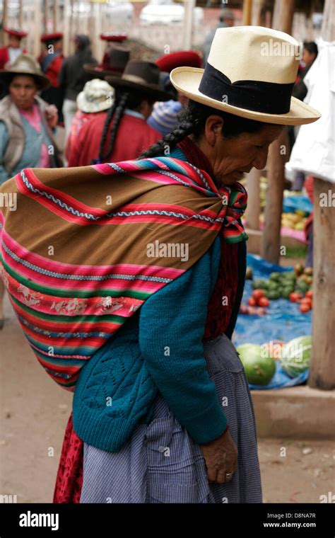 Quechua Woman On Traditional Indigenous Sunday Market In Chinchero Near