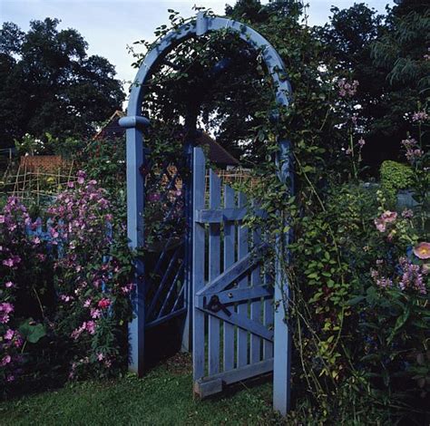 Check spelling or type a new query. Image: Pale blue painted wooden arch above blue gate in ...