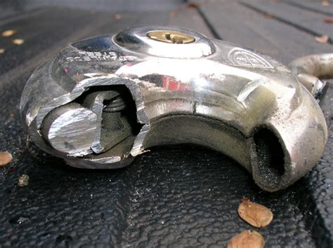 Insert the pointed end of the halligan between the shackle and the storage locker. Pros & Cons Of A Storage Facility