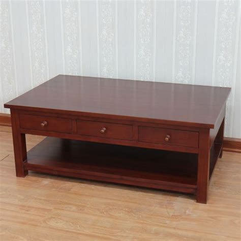 Constructed in mahogany and featuring brass corner plates and handles. Leafield Mahogany Coffee Table