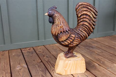 The rooster has the reputation of finding money in the most unlikely places, like drawing blood from a stone. Roosters - Sleepy Hollow Art