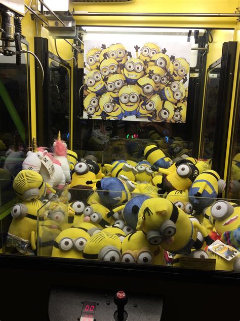 A Claw Machine Game Full Of Yellow Turds And A Random Unicorn Minionhate