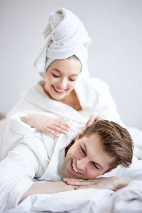 Funny Young Caucasian Couple Lying Together After Bathroom Shower Enjoy Weekends Stock Image